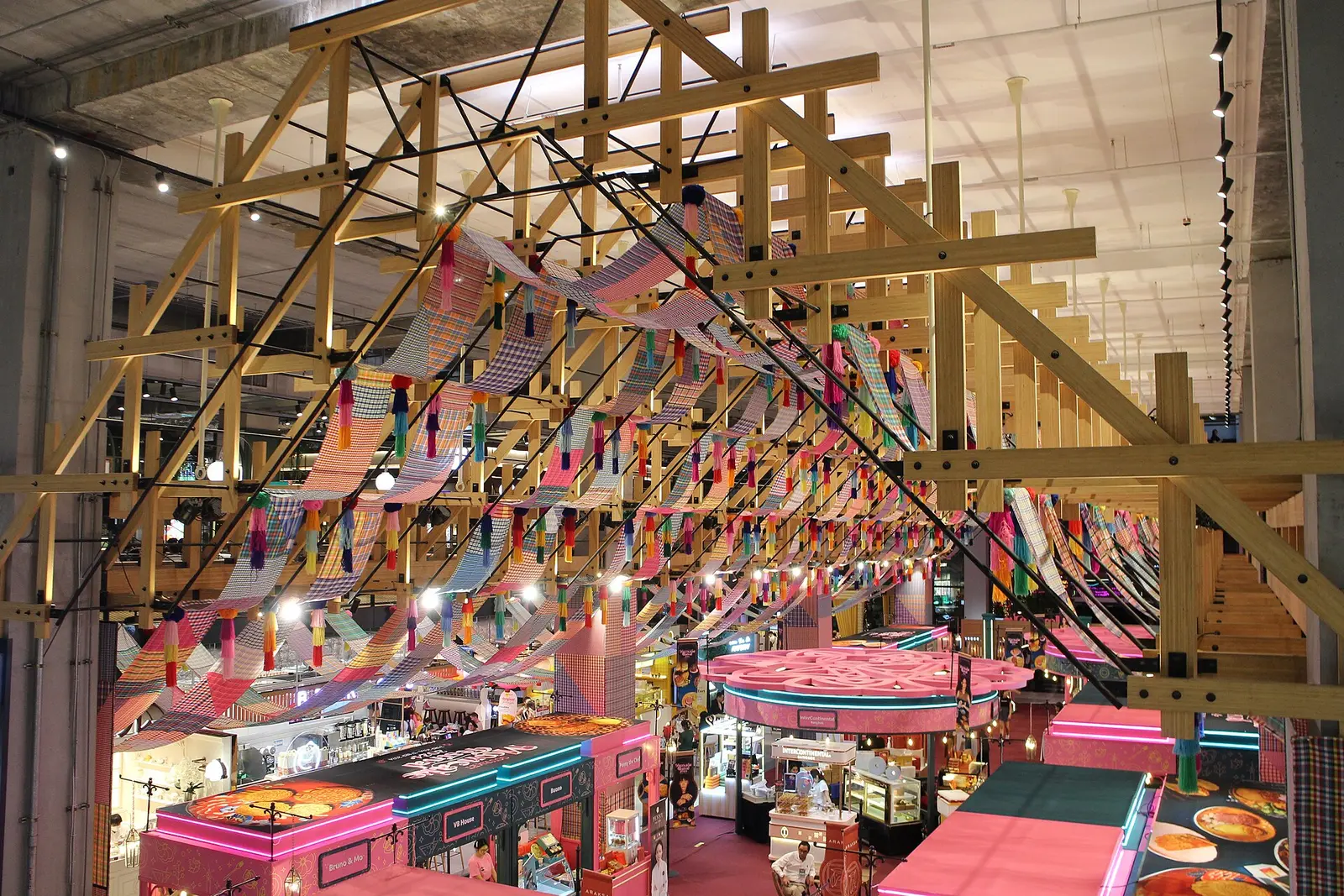 Decorated atrium of the EmSphere complex in Bangkok with market stalls below