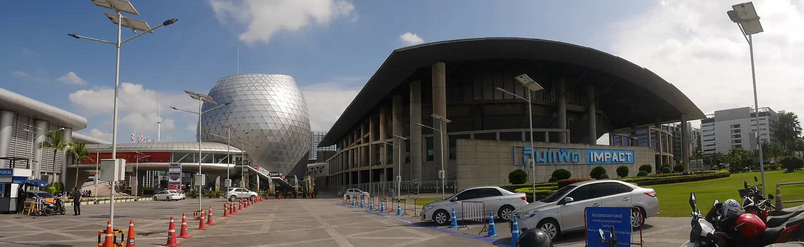 Front of the IMPACT Exhibition Center halls at Muang Thong Thani with the domed Challenger building beside it